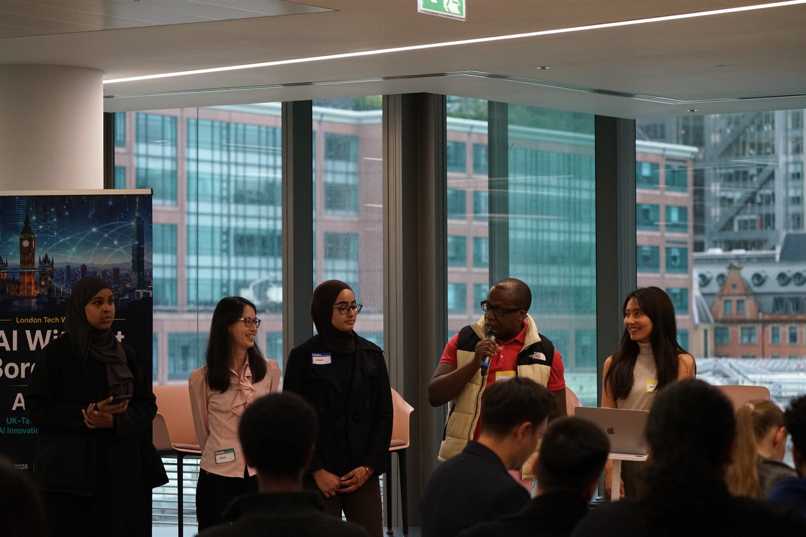 A team presenting on stage during the Build Lab showcase