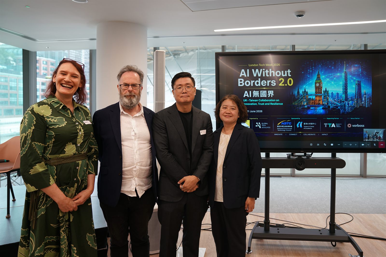 Panel 1 participants Maya Carlyle, John Spindler, YJ Chen and Ching-Yi Liu in front of the event screen